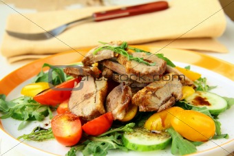 salad with duck breast, cherry tomatoes and arugula