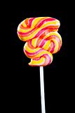 Colorful sweet lollipop. Shot on black background