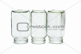 Three inverted glass bottles