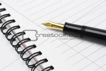 Fountain pen on notebook