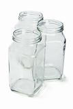 Three empty glass containers  