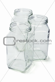 Three empty glass containers  
