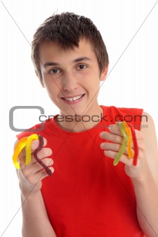 Boy holding handful of snakes