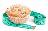 Diet muffin and centimiter isolated on a white background