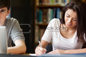 Students writing a paper