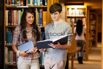 Smart students reading a book