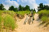 Wooden stairs over dunes at beach