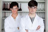 Male scientists posing