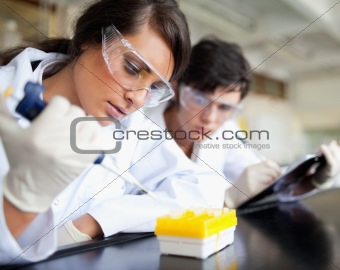 Serious young scientists working