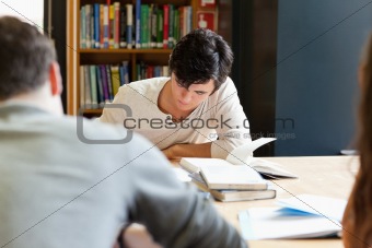 Young adults working on an essay