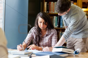Young students working on a essay