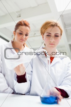 Portrait of science students doing an experiment