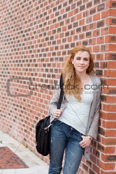 Portrait of a cute student standing up