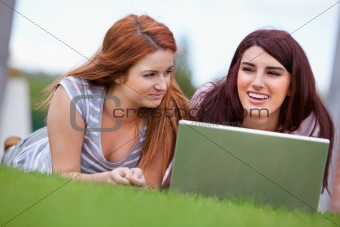 Young women working with a notebook