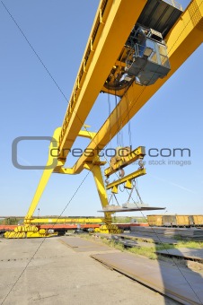 crane and steel plates