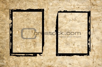 Two grunge frames on wall
