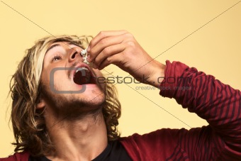 Young Man Eating Popcorn