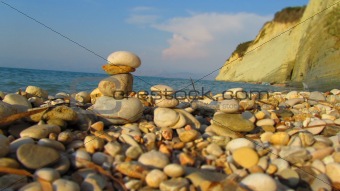 Columns of pebbles on the beach