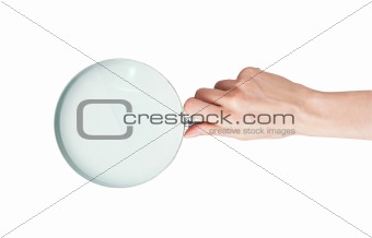 hand with magnifier isolated on white background