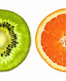 Orange and kiwi slices closeup isolated on a white background