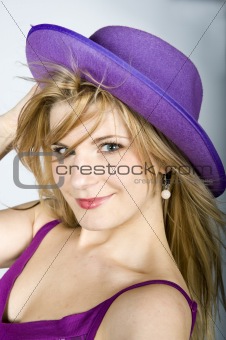 attractive woman with violet hat