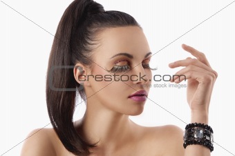 beauty shot with creative makeup and bracelet