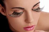 beauty shot with creative makeup with long lashes