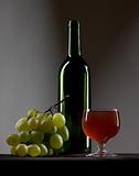 Grapes and wine bottle