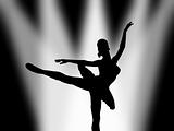 Ballet dancer under spotlight