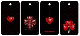 Black tags with heart shaped gemstones
