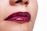 Girl's lips with dark red lipstick