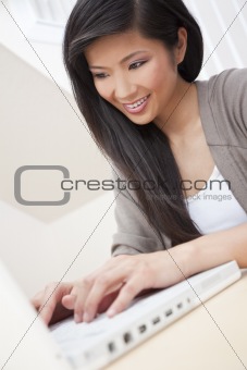 Beautiful Asian Chinese Woman Using Laptop Computer