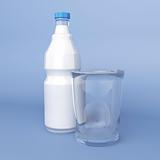 Empty glass and bottle of milk