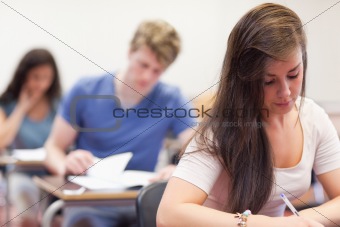 Good looking students having a test