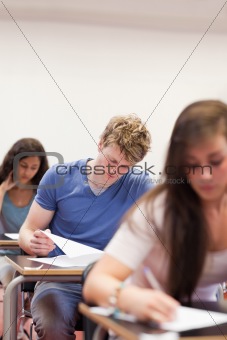 Portrait of young students doing an assignment