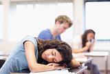 Student sleeping on her desk