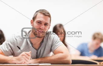 Smiling student sitting