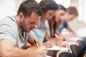 Serious students sitting for an examination