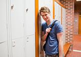 Student leaning on a locker