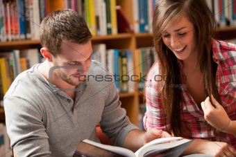 Students reading a book