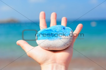 Sea rock in a hand