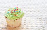 Vanilla cupcake with lime icing