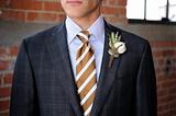 Gray Plaid suit with tan stripes and boutonniere