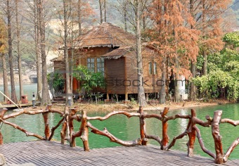 wood house on water