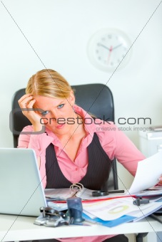 Stressed business woman at work
