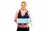 Smiling business woman with gift in hand
