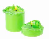 Two large green lighted candle