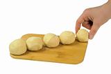Flour the dough on a wooden board
