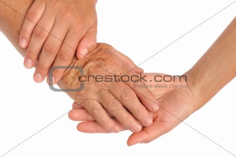 Hands of young and senior women - helping hand concept - clipping path included