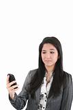 portrait of angry female looking at cellphone, isolated on white
